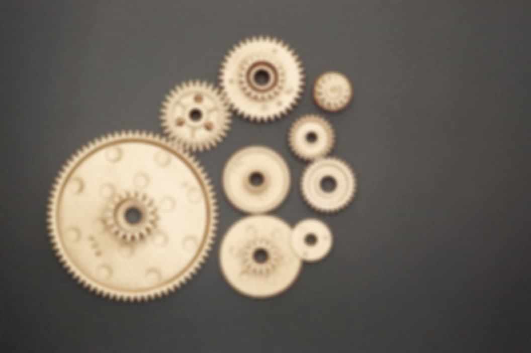 Picture of cogs of different sizes.